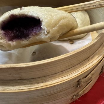 Jinlan Dumplings - The beautifully purple inside of a steamed ube dumpling! - Chinese Near Me - Rockville, Maryland