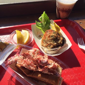 Nancy's - Traditional lobster roll, clam stuffie, extra lemon and pepper (duh) and a dirty banana! Can't go wrong. - Seafood Near Me - Oak Bluffs, Massachusetts Nancy's - Traditional lobster roll, clam stuffie, extra lemon and pepper (duh) and a dirty banana! Can't go wrong. - Seafood Near Me - Oak Bluffs, Massachusetts
