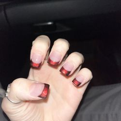 Red chrome french tips from Lucky Nails