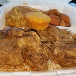 Tha Spott Soulfood & More Catering - Neckbones & rice special $10 I chose dressing(w/ gravy) & candied yams & a corn muffin w/ strawberry lemonade