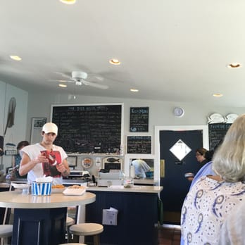 The Dock House - Chalk board menu with tall tables and a bar on the back wall - Seafood Near Me - Sag Harbor, New York The Dock House - Chalk board menu with tall tables and a bar on the back wall - Seafood Near Me - Sag Harbor, New York