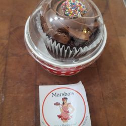 Marsha’s - Pictured is the lable from the cake box and a chocolate cupcakes with chocolate buttercream icing.