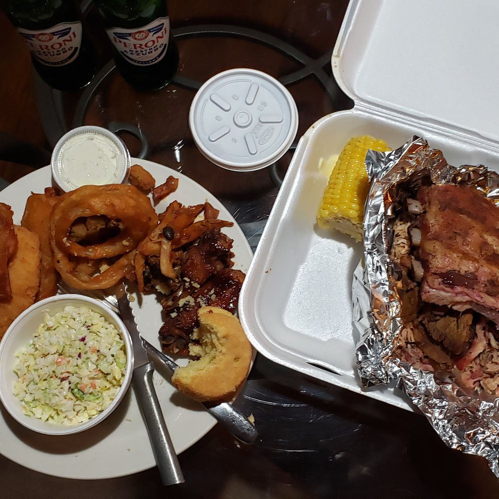 Grumpy Jake's BBQ - Side of slaw with a small portion of the Family Platter appetizer. On the right is the Jake's Super BBQ Sampler. - Barbeque Near Me - Pinetop-Lakeside, Arizona Grumpy Jake's BBQ - Side of slaw with a small portion of the Family Platter appetizer. On the right is the Jake's Super BBQ Sampler. - Barbeque Near Me - Pinetop-Lakeside, Arizona