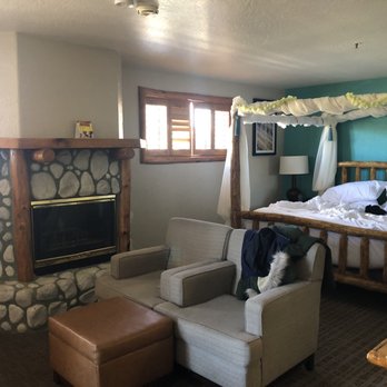 Holiday Inn The Lodge at Big Bear Lake - fireplace with view of couch & bed - Big Bear, CA