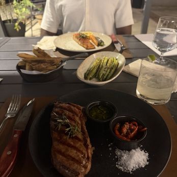 Noble Argentinian Steakhouse - NY Strip Steak, Salmon, Rustic Potatoes, Asparagus - Steakhouses Near Me - Charlottesville, Virginia
