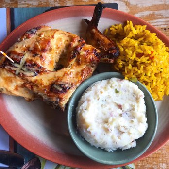 Nando's Peri-Peri - 1/4 chicken breast, Spanish rice, mashed potatoes. - South African Near Me - Baltimore, Maryland Nando's Peri-Peri - 1/4 chicken breast, Spanish rice, mashed potatoes. - South African Near Me - Baltimore, Maryland