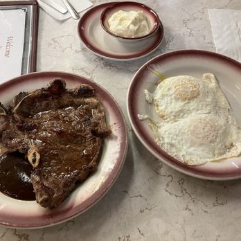 Tastee Diner - T-bone w/over easy eggs. Steak is ok. Eggs were cooked exactly like I like them. - Diners Near Me - Bethesda, Maryland