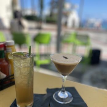 The Naughty Fox - two cocktails on a table - New American Near Me - Avalon, California The Naughty Fox - two cocktails on a table - New American Near Me - Avalon, California