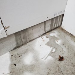 Chicagoland Garage Builders - Water coming in from between the south wall and foundation from poor workmanship and installation error.