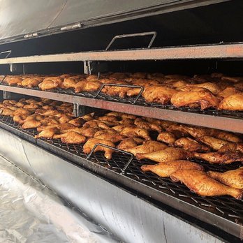 Saucy Beard Bbq - Chicken loaded up on the smoker. - Caterers Near Me