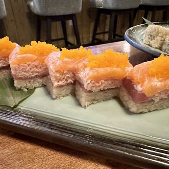 Imura Sushi & Robata - Golden Bridge Roll - pressed roll w/ salmon, crab meat, tuna, smelt fish egg, and rice ($20) - Japanese Near Me - Frisco, Texas Imura Sushi & Robata - Golden Bridge Roll - pressed roll w/ salmon, crab meat, tuna, smelt fish egg, and rice ($20) - Japanese Near Me - Frisco, Texas