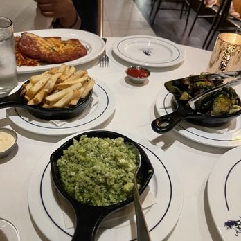 King Steak - Spinach & Artichoke dip, beef tallow fries, and crispy  Brussels sprouts - Steakhouses Near Me - Houston, Texas