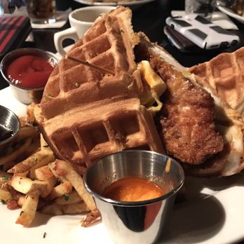 Crisp - Chicken and waffles - with an egg - Italian Near Me - Houston, Texas Crisp - Chicken and waffles - with an egg - Italian Near Me - Houston, Texas