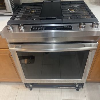 Appliance Care - Image of the entire range with access to downdraft open. - Appliances & Repair Near Me - Alexandria, Virginia