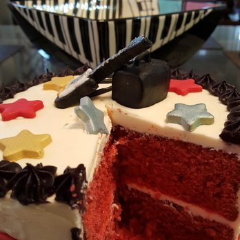 Sweet Relief - a red velvet cake with a slice taken out of it - Bakeries Near Me Sweet Relief - a red velvet cake with a slice taken out of it - Bakeries Near Me