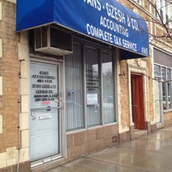 Evans-Gzesh & Company - Front on a rainy day.