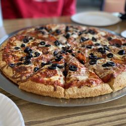 Pizza King - Large pepperoni, olive, and cheese pizza