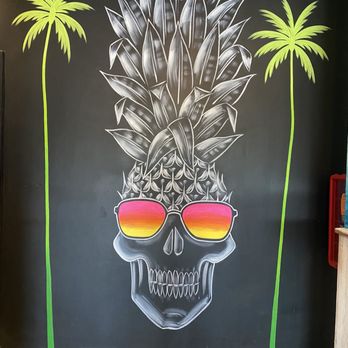 Playa Bowls - a skull with sunglasses and a pineapple - Acai Bowls Near Me - Jupiter, Florida