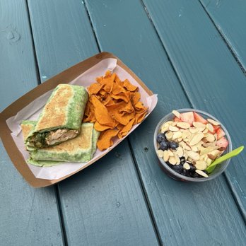 O'Side Strand Cafe - Chicken pesto sandwich in a wrap and açaí bowl. - Coffee & Tea Near Me - Oceanside, California O'Side Strand Cafe - Chicken pesto sandwich in a wrap and açaí bowl. - Coffee & Tea Near Me - Oceanside, California