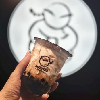 AbouTea - a hand holding a cup of iced coffee - Bubble Tea Near Me - South Salt Lake, Utah AbouTea - a hand holding a cup of iced coffee - Bubble Tea Near Me - South Salt Lake, Utah