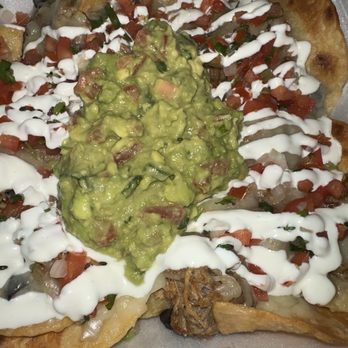 Don Quixote's Mexican Grill - Carnitas nachos added guacamole - Mexican Near Me - Sacramento, California Don Quixote's Mexican Grill - Carnitas nachos added guacamole - Mexican Near Me - Sacramento, California