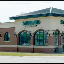 Saveland Supermarket - Storefront from Champagne Park