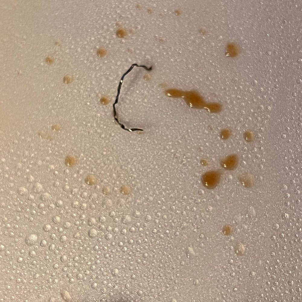 a piece of food left on a cutting board