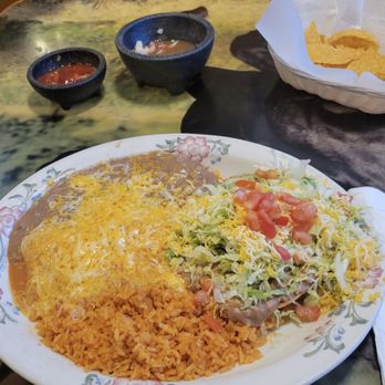 El Rodeo Restaurant - My combination meal of a cheese enchilada, bean tostada, rice and beans on the side. - Mexican Near Me - Moses Lake, Washington El Rodeo Restaurant - My combination meal of a cheese enchilada, bean tostada, rice and beans on the side. - Mexican Near Me - Moses Lake, Washington