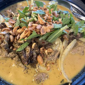 Cafe Artist Restaurant - Goat curry (comes with sesame cracker) - Seafood Near Me - Garden Grove, California Cafe Artist Restaurant - Goat curry (comes with sesame cracker) - Seafood Near Me - Garden Grove, California