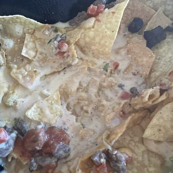 Rusty Taco - Nachos swimming in pool of cheese - Tex-Mex Near Me - Plano, Texas Rusty Taco - Nachos swimming in pool of cheese - Tex-Mex Near Me - Plano, Texas