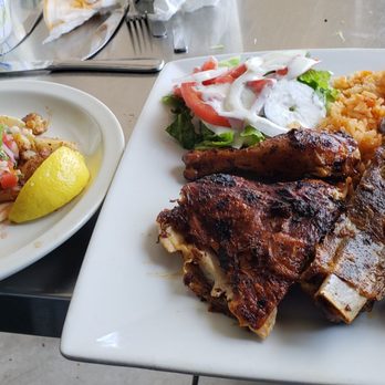 What A Chicken - Fish taco on the left & 2 meat combo with chicken & pork ribs on the right. Combo only $10. Great food. - Mexican Near Me - Petaluma, California What A Chicken - Fish taco on the left & 2 meat combo with chicken & pork ribs on the right. Combo only $10. Great food. - Mexican Near Me - Petaluma, California