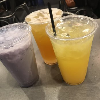 Red Flame - From left to right, taro milk tea, passion fruit green tea with coconut lychee, and mango lemonade with the straw in it. - Hot Pot Near Me - Westminster, California Red Flame - From left to right, taro milk tea, passion fruit green tea with coconut lychee, and mango lemonade with the straw in it. - Hot Pot Near Me - Westminster, California