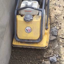 Soil compaction behind retaining walls