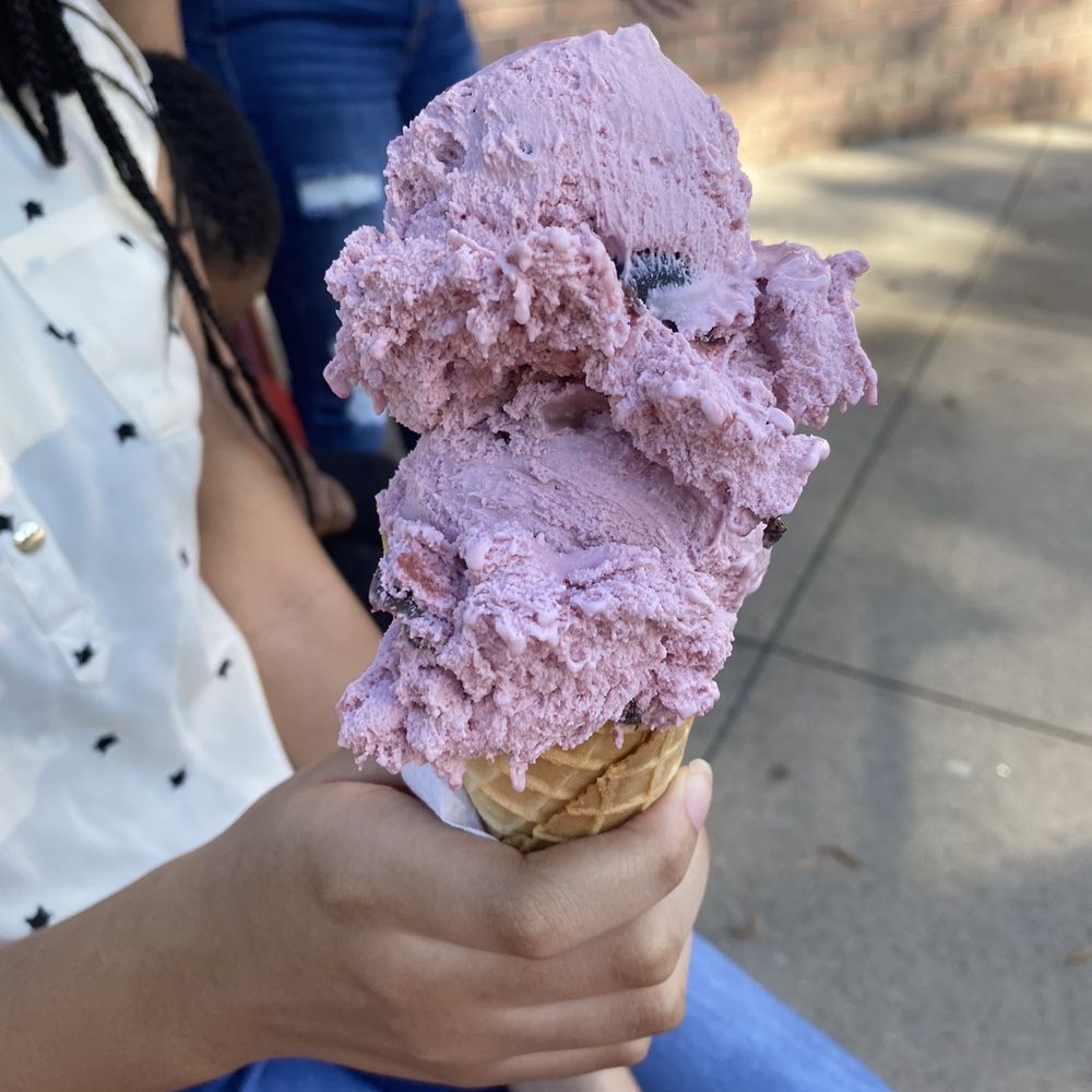 Double Scoop Ice Cream - a woman holding a cone of ice cream - Ice Cream & Frozen Yogurt Near Me - Lithonia, Georgia