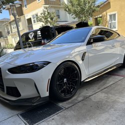 2023 BMW M4 all shined up after receiving our car wash service.