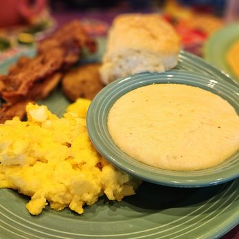 The Flying Biscuit Cafe - Scrambled eggs, bacon, grits, sausage.... - New American Near Me - Gainesville, Florida The Flying Biscuit Cafe - Scrambled eggs, bacon, grits, sausage.... - New American Near Me - Gainesville, Florida