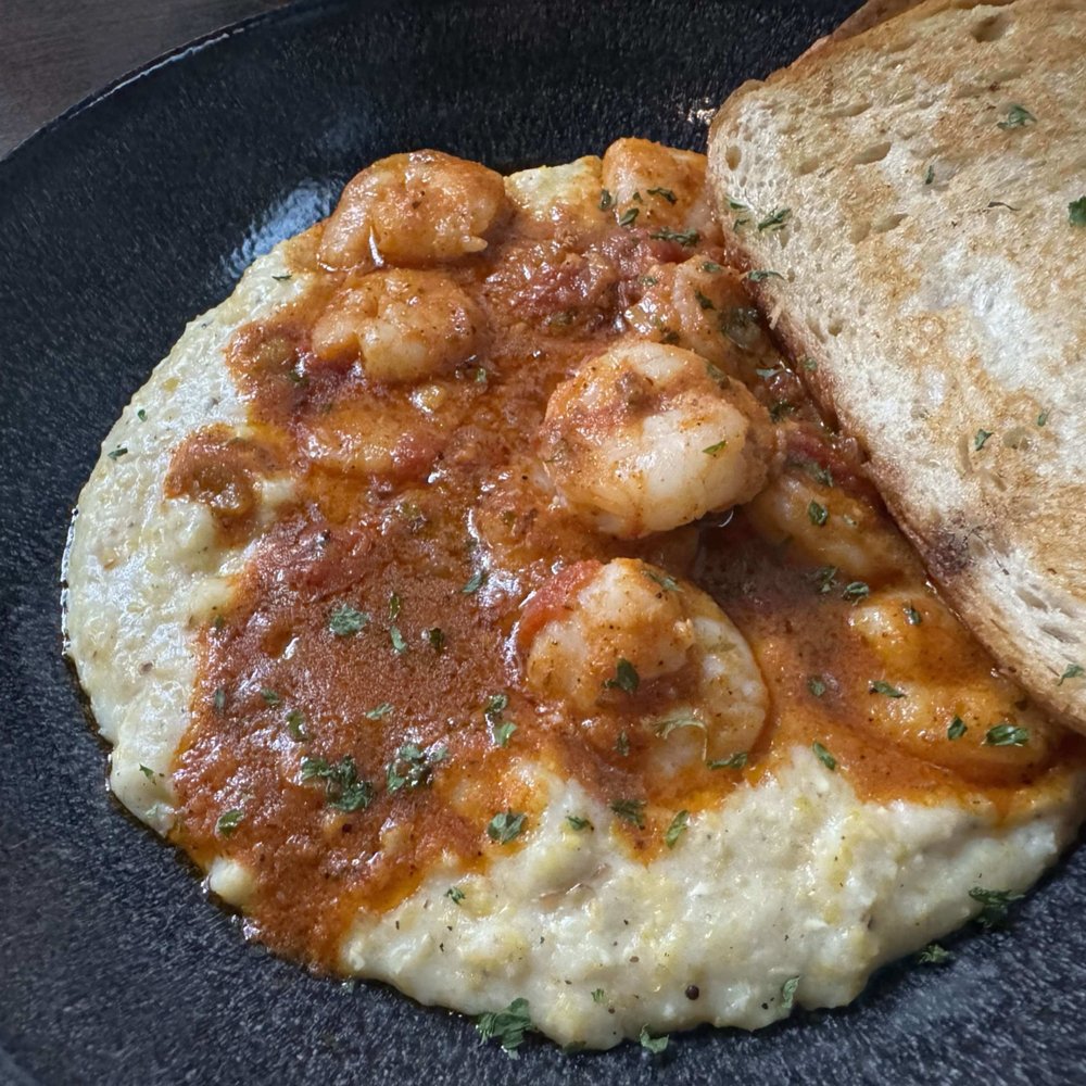 Bosscat Kitchen & Libations - Love love love this dish w/a tiny kick! Shrimp made perfectly, grits are cheesy & smooth, sauce has a tiny kick. My 6th time ordering this! - Bars Near Me - Orange, California Bosscat Kitchen & Libations - Love love love this dish w/a tiny kick! Shrimp made perfectly, grits are cheesy & smooth, sauce has a tiny kick. My 6th time ordering this! - Bars Near Me - Orange, California