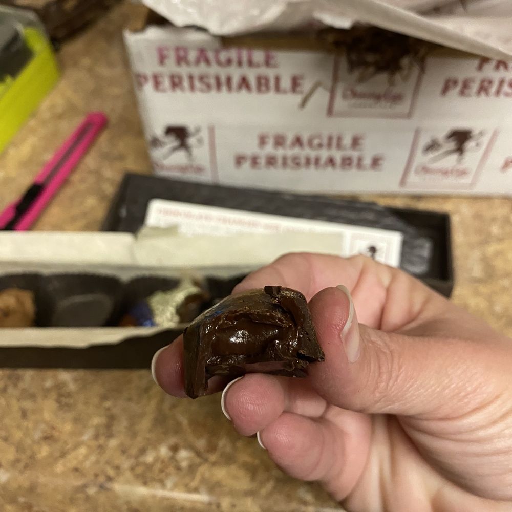 Dancing Lion Chocolate - This one had a delicious chocolate raspberry filling - Coffee & Tea Near Me - Manchester, New Hampshire