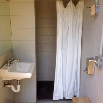 Mayo Park - Inside the bathhouse. Separate shower spaces. - Boating Near Me - Roxboro, North Carolina