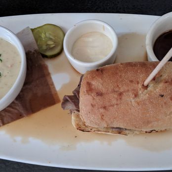 Yard House - They spilled dip sauce all over my Cuban roast pork dip. Also, got food poisoning from this dish. - New American Near Me - Irvine, California