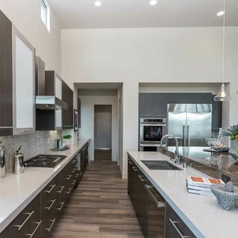 Nature'stone - a modern kitchen with white countertops - General Contractors Near Me - North Palm Springs, California Nature'stone - a modern kitchen with white countertops - General Contractors Near Me - North Palm Springs, California