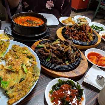 Always Spring Restaurant - Seafood pancake (left), seafood sundubu (top), beef bulgogi (middle), pork bulgogi (right) and some side dishes! - Korean Near Me - Beaverton, Oregon Always Spring Restaurant - Seafood pancake (left), seafood sundubu (top), beef bulgogi (middle), pork bulgogi (right) and some side dishes! - Korean Near Me - Beaverton, Oregon