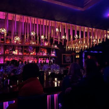 Under The Boot - people sitting at a bar - Wine Bars Near Me - Jersey City, New Jersey