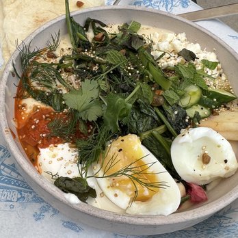 Beet Box - Hummus plate with greens and other mixing.  Was served with turkish lavash bread. - Middle Eastern Near Me - Columbia, Missouri