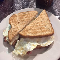 George's Bar & Grill - Egg white sandwich with crispy bacon, American cheese on Wheat. $4.99