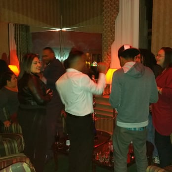 The Red Lounge - a group of people in a living room - Hookah Bars Near Me - Binghamton, New York The Red Lounge - a group of people in a living room - Hookah Bars Near Me - Binghamton, New York