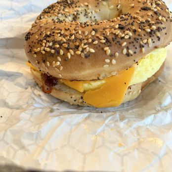 The Daily Grind - Bacon egg and cheddar cheese everything bagel - Coffee & Tea Near Me - Surf City, North Carolina The Daily Grind - Bacon egg and cheddar cheese everything bagel - Coffee & Tea Near Me - Surf City, North Carolina