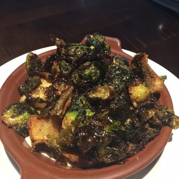 Yard House - Brussel sprout appetizer with delicious aioli sauce underneath. - New American Near Me - Dallas, Texas Yard House - Brussel sprout appetizer with delicious aioli sauce underneath. - New American Near Me - Dallas, Texas