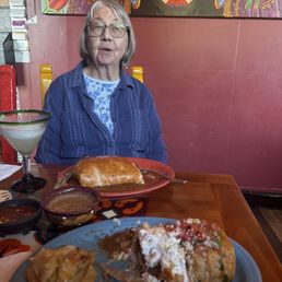 Two massive burritos and margaritas Two massive burritos and margaritas