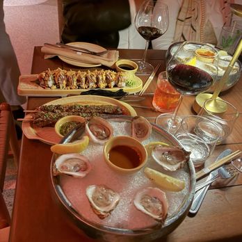 Mayami Wynwood - Fresh oysters and la vara (sirloin on a stick) with chimichuri and the land and sea roll - Mexican Near Me - Miami, Florida Mayami Wynwood - Fresh oysters and la vara (sirloin on a stick) with chimichuri and the land and sea roll - Mexican Near Me - Miami, Florida